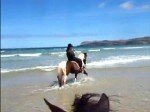 Walking in the Atlantic Ocean on horseback
